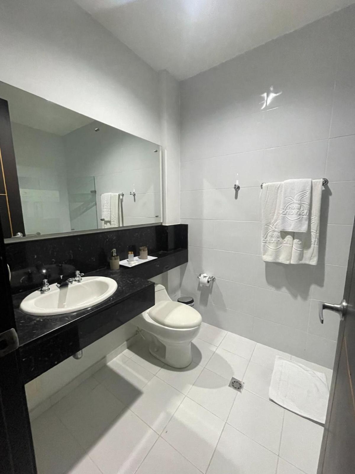 Hotel Santorini Loft Monteria Bagian luar foto