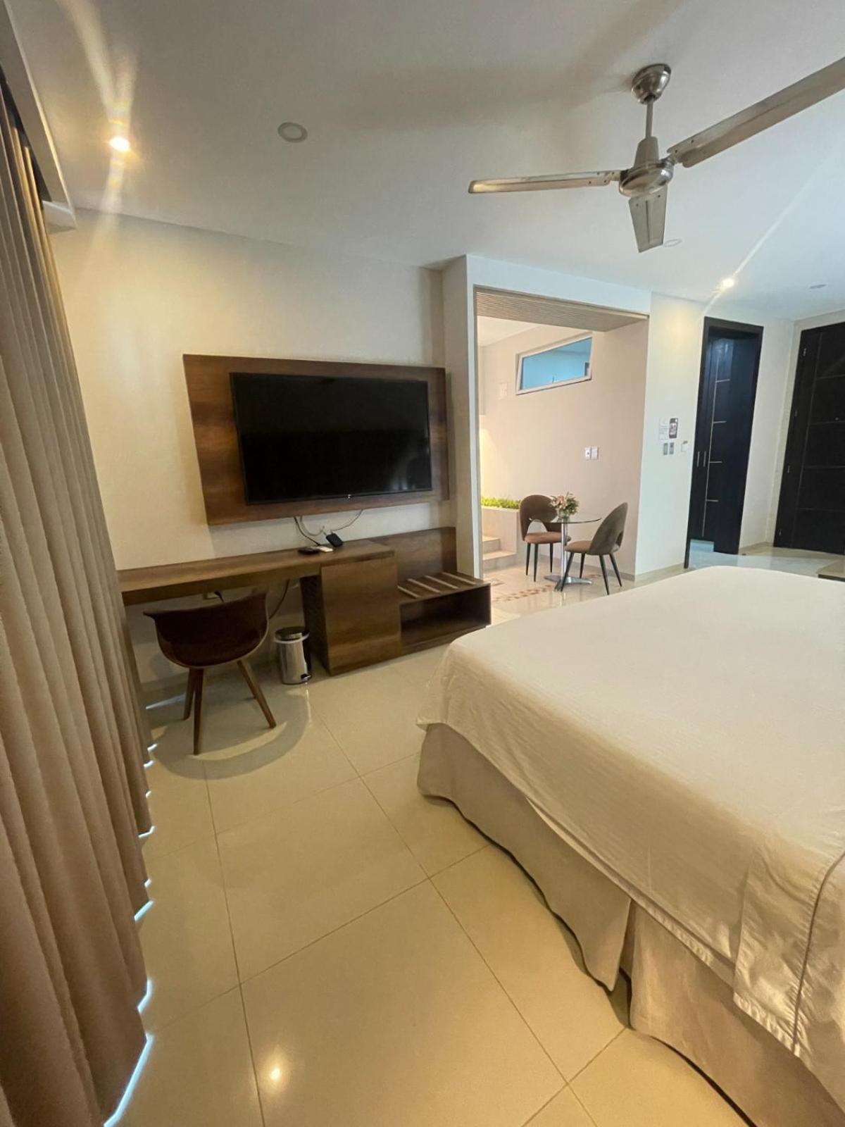 Hotel Santorini Loft Monteria Bagian luar foto