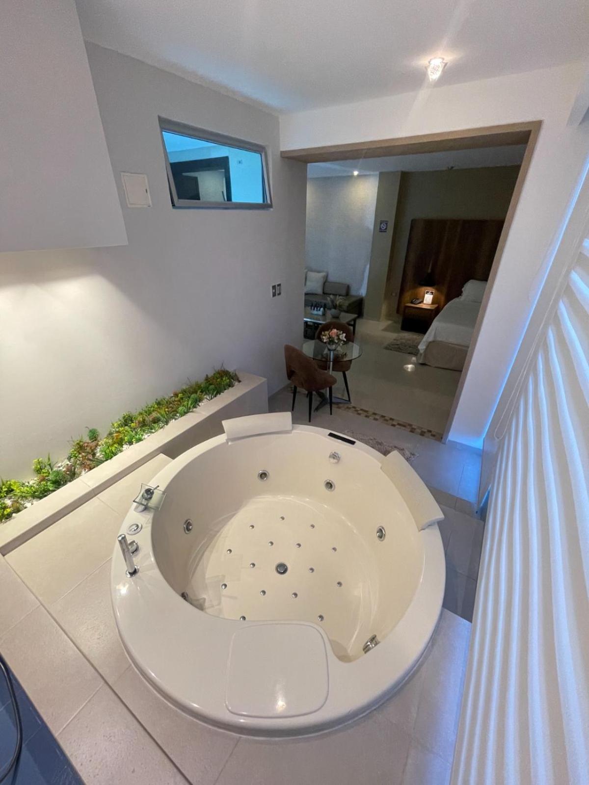 Hotel Santorini Loft Monteria Bagian luar foto