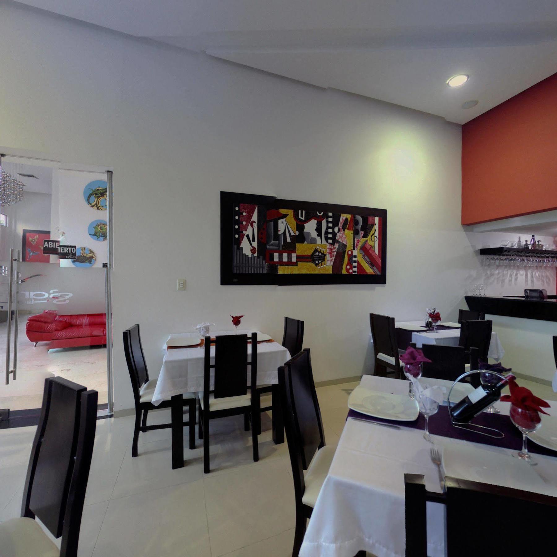 Hotel Santorini Loft Monteria Bagian luar foto