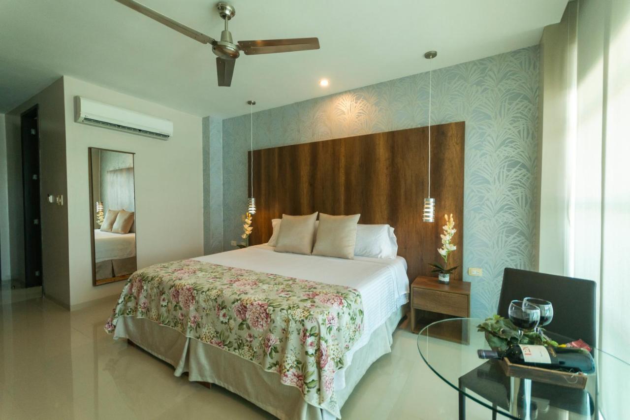 Hotel Santorini Loft Monteria Bagian luar foto