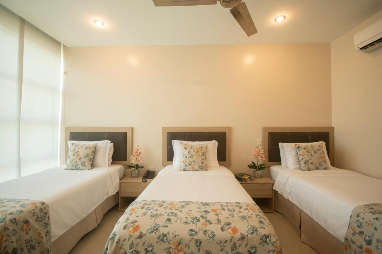 Hotel Santorini Loft Monteria Bagian luar foto