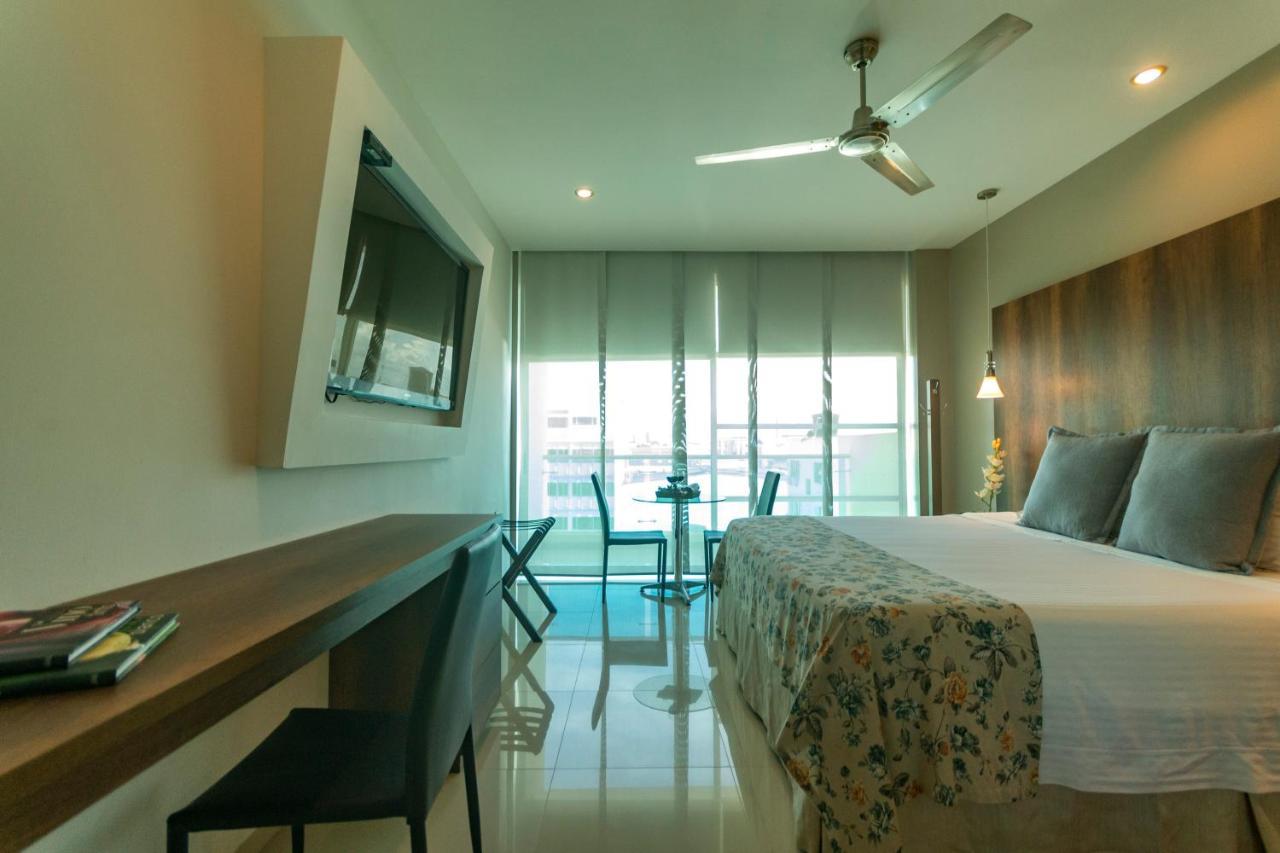 Hotel Santorini Loft Monteria Bagian luar foto