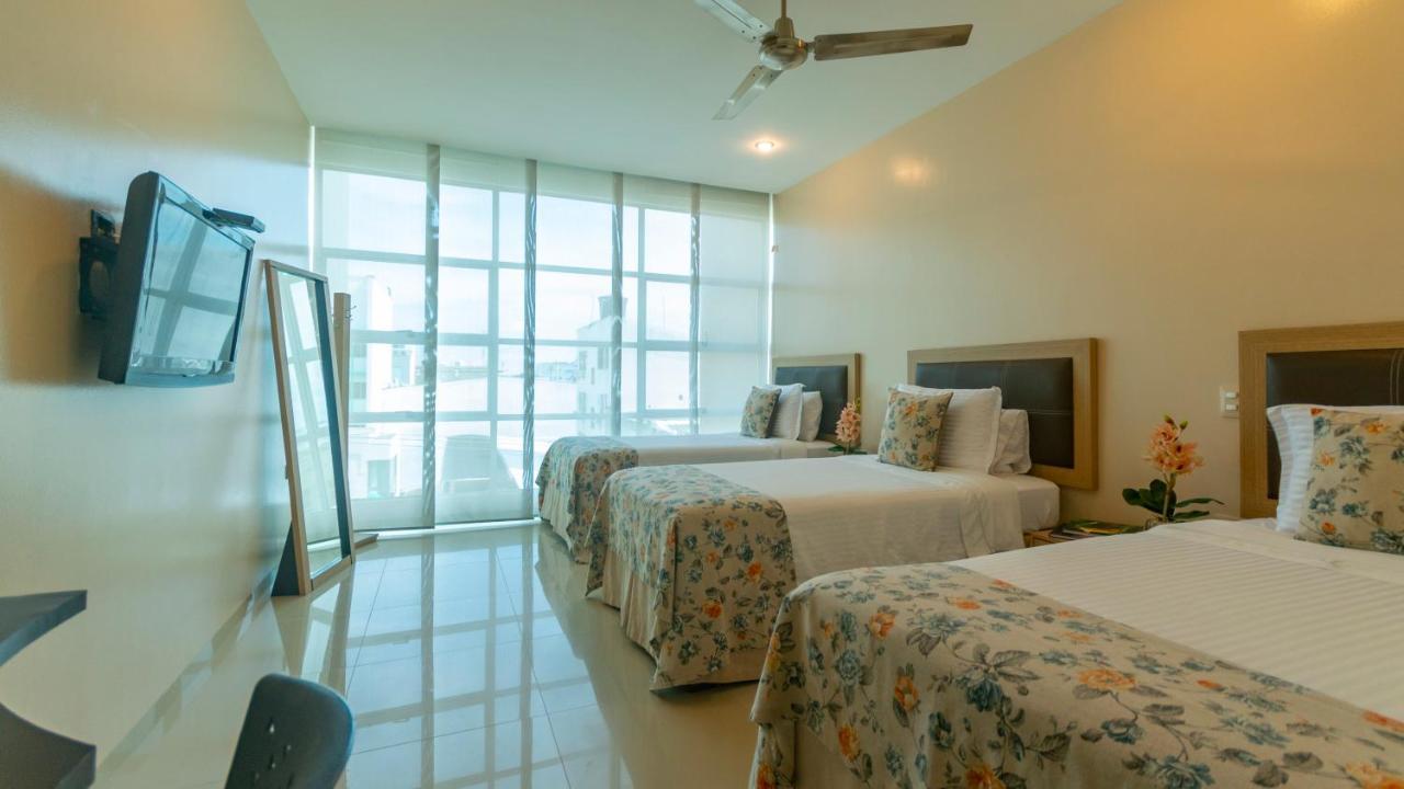 Hotel Santorini Loft Monteria Bagian luar foto