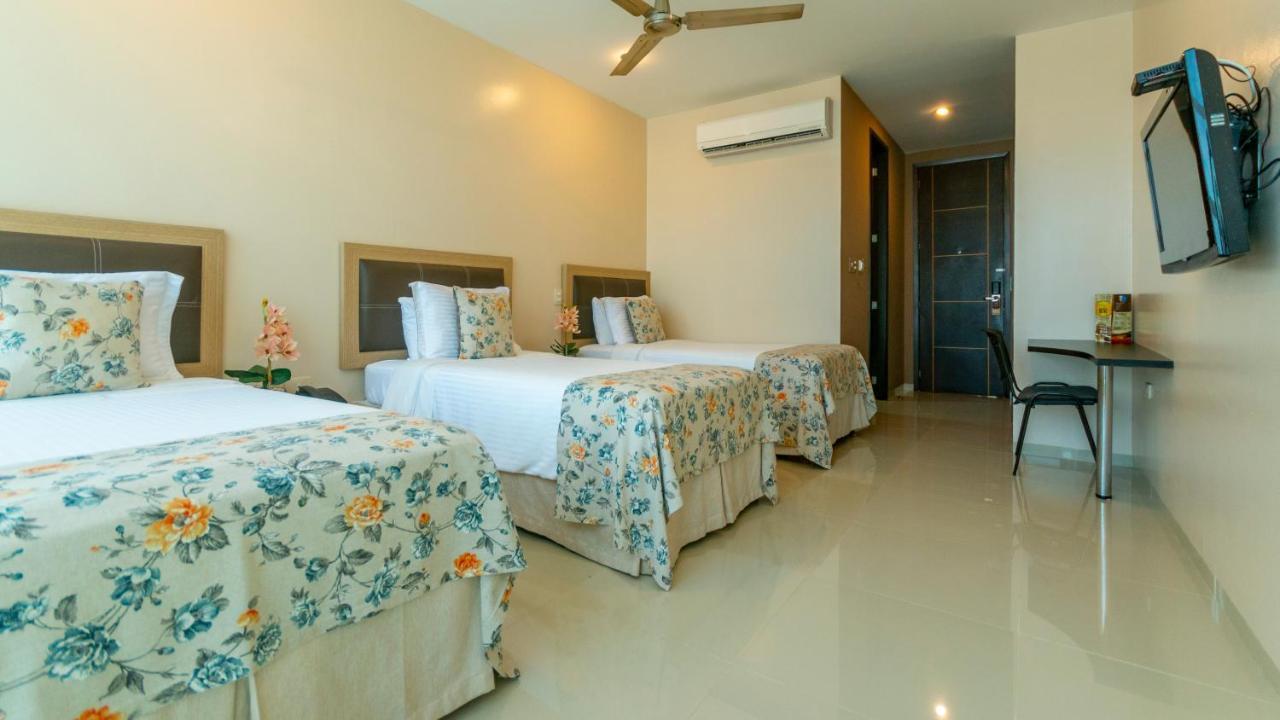 Hotel Santorini Loft Monteria Bagian luar foto