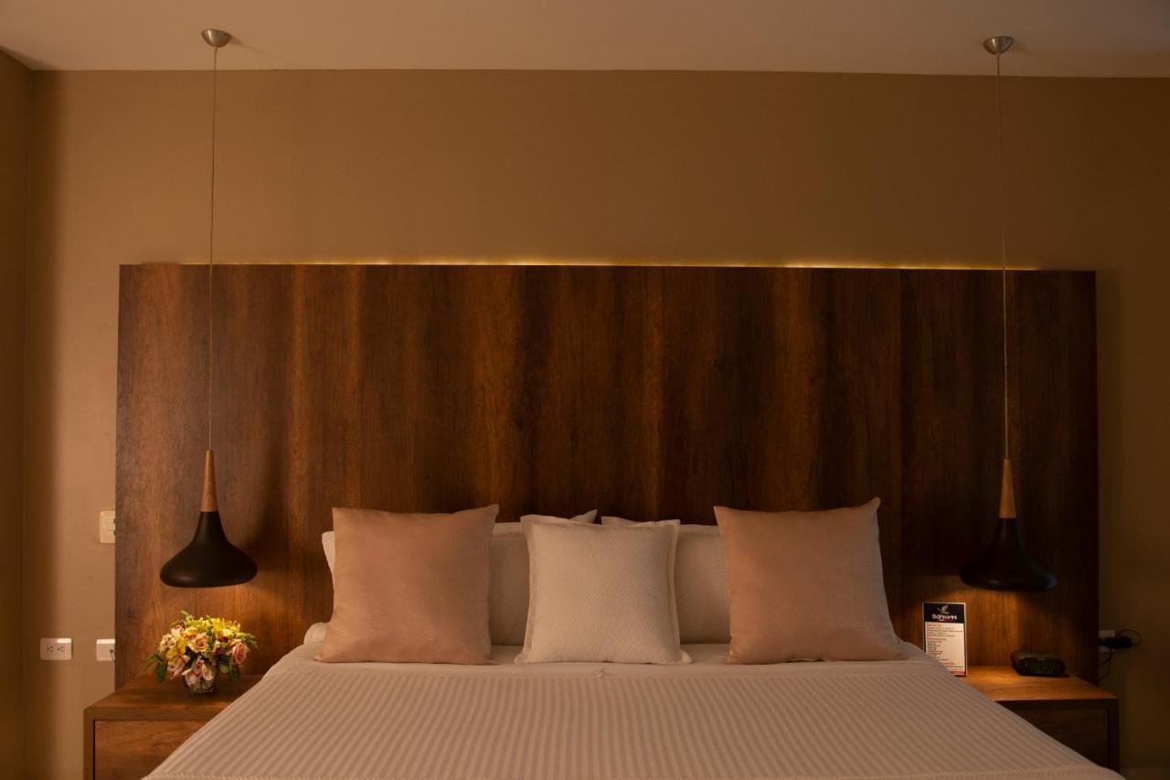 Hotel Santorini Loft Monteria Bagian luar foto